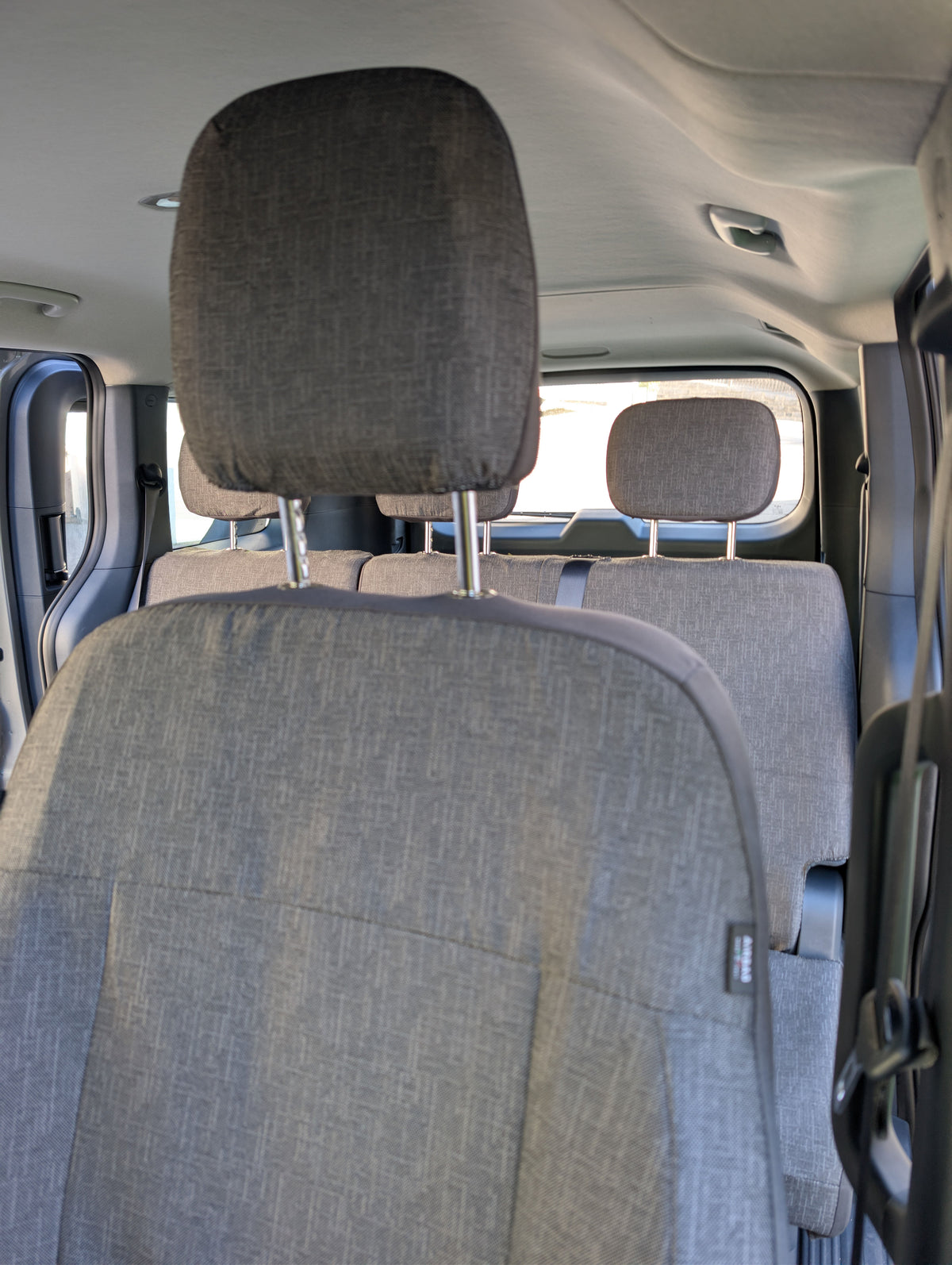 Maßgeschneiderte Sitzbezüge für Kia PV5 Passenger – Komplettset 5 Sitze | Über 30 italienische Stoffe